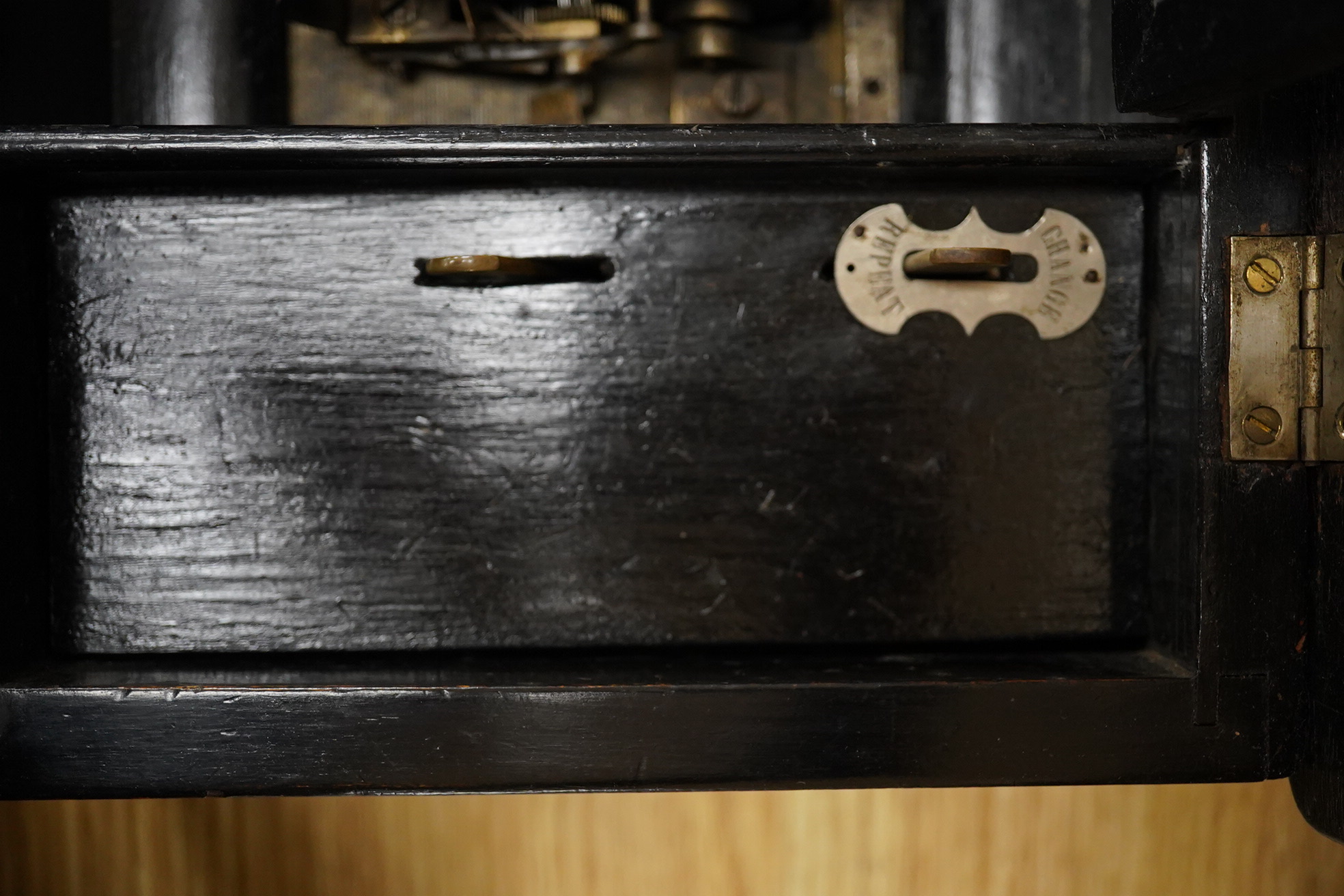 A mid-19th century inlaid and ebonised rosewood Swiss cylinder music box playing eight airs, card label to the inside of the lid listing the airs, complete with all teeth to the comb, cylinder 15.3cm long, the case; 43cm
